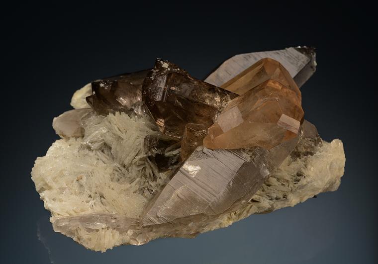TOPAZ on QUARTZ var. Smoky with ALBITE (repaired)